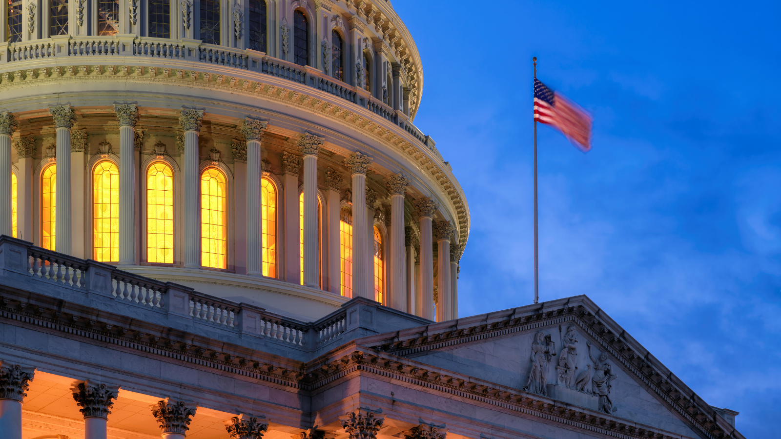U.S. Capitol building in DC, captured at night.