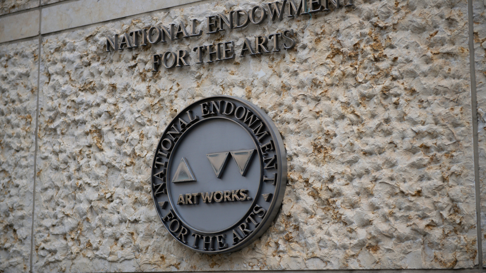 Photo of the National Endowment for the Arts signage on their building